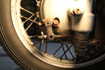 The grungy Zundapp KS601 brake lever and shifter linkage.